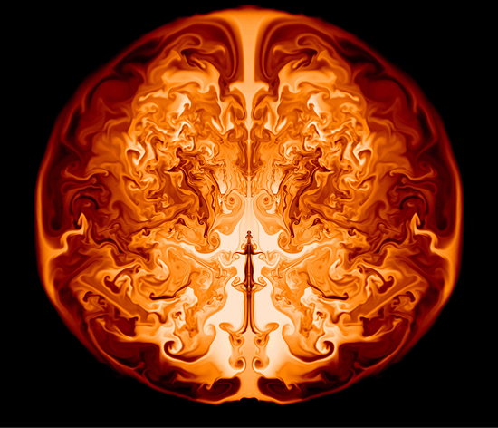 This image is a slice through the interior of a supermassive star of 55,500 solar masses along the axis of symmetry. It shows the inner helium core in which nuclear burning is converting helium to oxygen, powering various fluid instabilities (swirling lines). This snapshot shows a moment one day after the onset of the explosion, when the radius of the outer circle would be slightly larger than that of the orbit of the Earth around the sun. Credit: Ken Chen, UC Santa Cruz 
