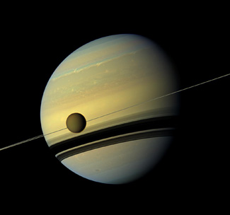 New Cassini data from Titan indicate a rigid, weat